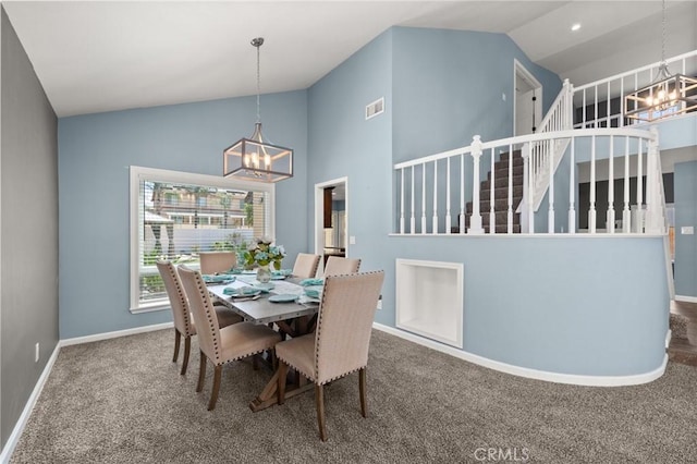 9334 Shamouti Dr, Riverside, CA 92508 - dining area with a chandelier, carpet, baseboards, and high vaulted ceiling