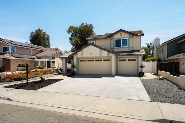9334 Shamouti Dr, Riverside, CA 92508 - view of front of house with driveway and an attached garage