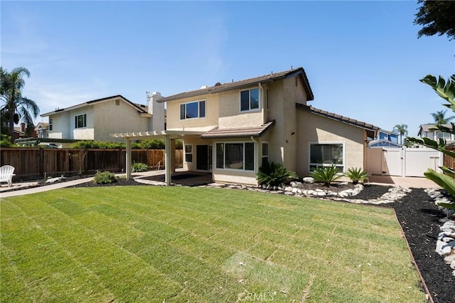 9334 Shamouti Dr, Riverside, CA 92508 - back of property featuring a patio, a pergola, stucco siding, and a gate