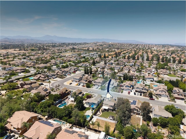 9334 Shamouti Dr, Riverside, CA 92508 - aerial overview of property's location with nearby suburban area and mountains