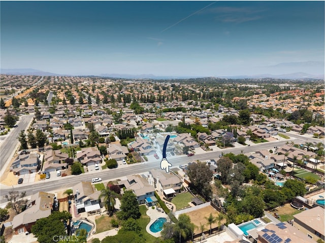 9334 Shamouti Dr, Riverside, CA 92508 - aerial overview of property's location with nearby suburban area and a pool