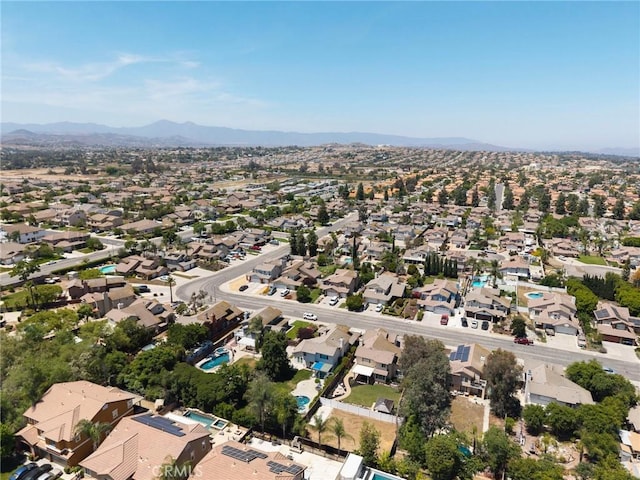 9334 Shamouti Dr, Riverside, CA 92508 - aerial view of property and surrounding area featuring nearby suburban area and a mountainous background