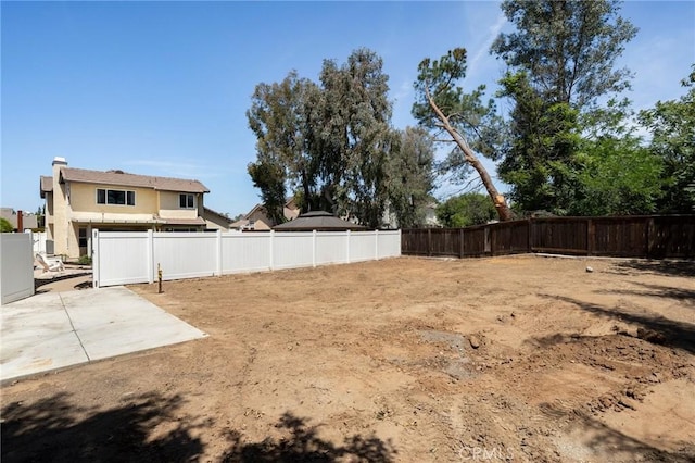 9334 Shamouti Dr, Riverside, CA 92508 - fenced backyard featuring a patio area