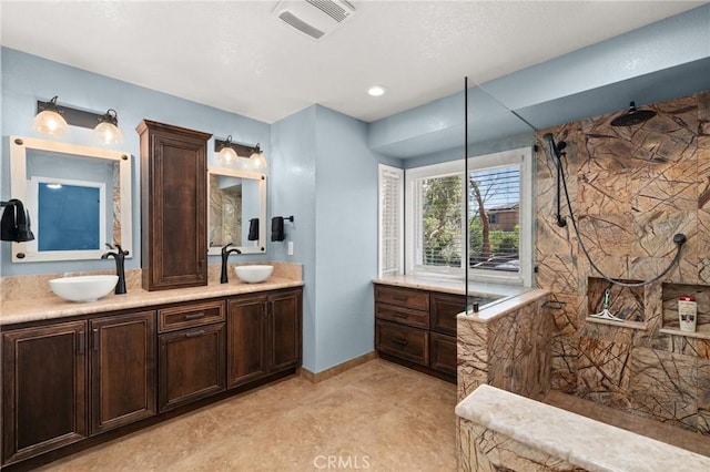 9334 Shamouti Dr, Riverside, CA 92508 - full bath with double vanity, a marble finish shower, and baseboards