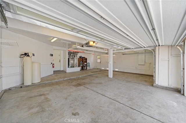 9334 Shamouti Dr, Riverside, CA 92508 - garage featuring a garage door opener