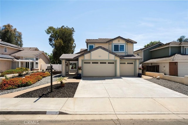 9334 Shamouti Dr, Riverside, CA 92508 - view of front of property with driveway and an attached garage