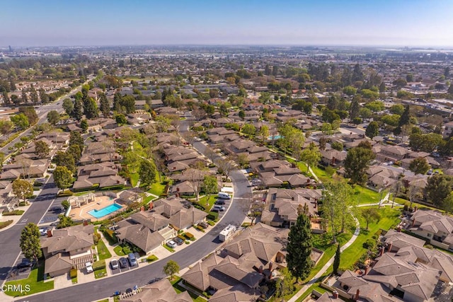 birds eye view of property with a residential view