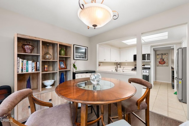dining space with light tile patterned flooring