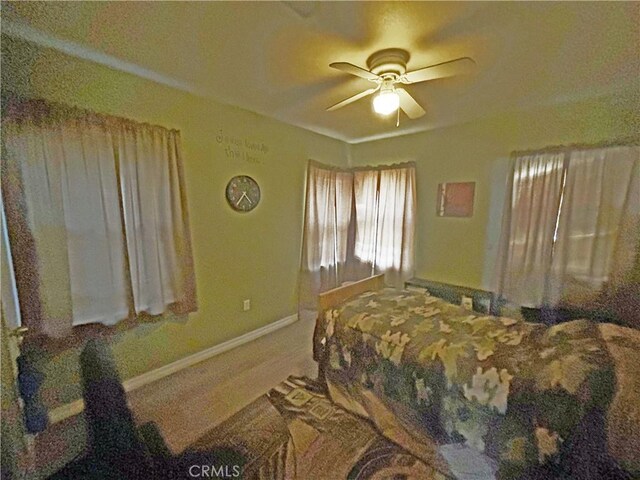 1391 N Crescent Ave, San Bernardino, CA 92405 - bedroom featuring baseboards, carpet flooring, and a ceiling fan