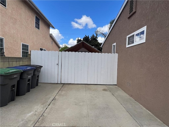 view of patio featuring fence