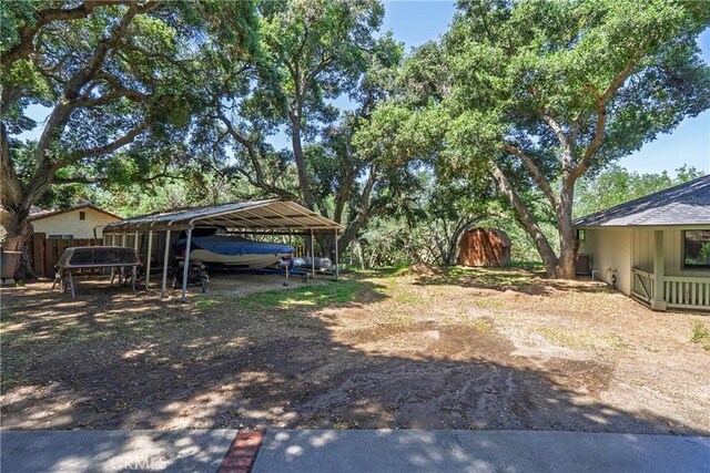 9553 Durango Rd, Atascadero, CA 93422 - view of yard featuring a carport and driveway