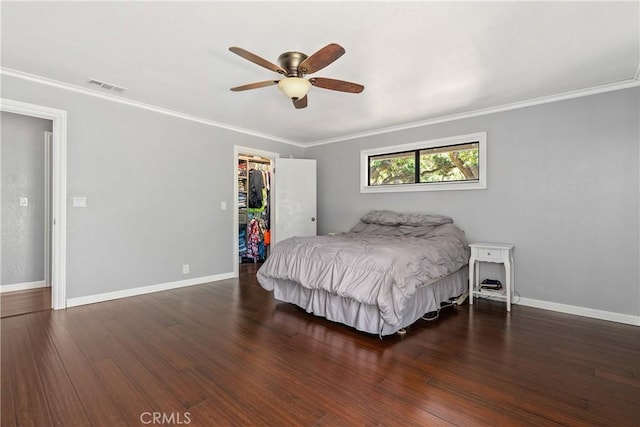 9553 Durango Rd, Atascadero, CA 93422 - bedroom featuring wood finished floors, baseboards, a spacious closet, crown molding, and a closet