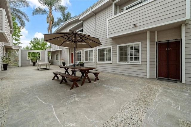 view of patio featuring outdoor dining area