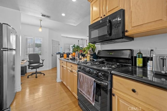 kitchen with recessed lighting, light brown cabinets, light wood-style floors, black appliances, and visible vents