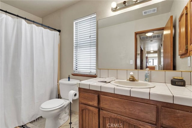 full bath with tile patterned floors, visible vents, toilet, and vanity
