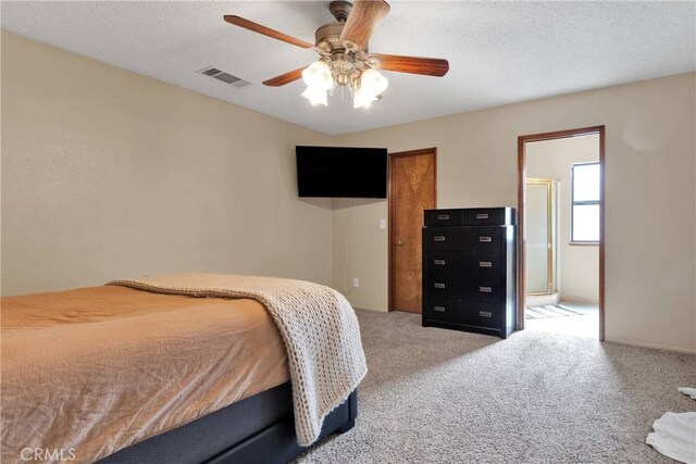 bedroom with a ceiling fan, visible vents, and light carpet