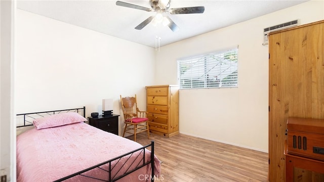 8737 Tilmont Ave, Pico Rivera, CA 90660 - bedroom with baseboards, ceiling fan, and light wood finished floors