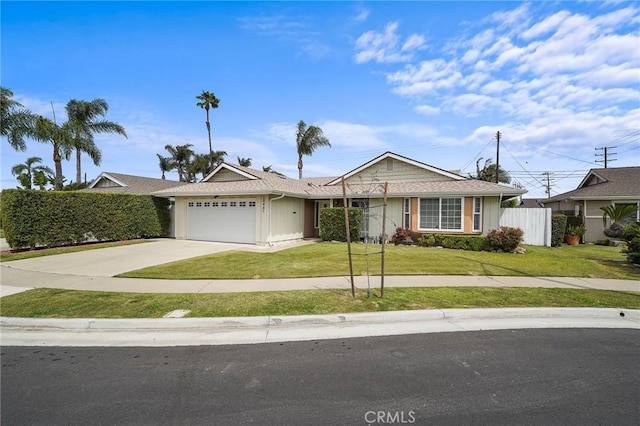 ranch-style house featuring a garage, a front lawn, fence, and driveway