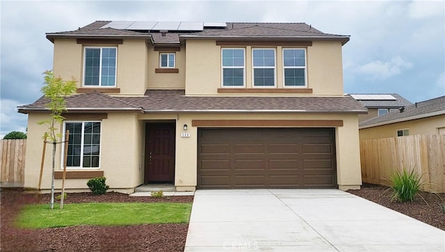 368 Arpent Ct, Merced, CA 95341 - traditional home featuring driveway, stucco siding, a garage, solar panels, and a shingled roof