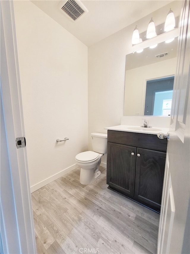 368 Arpent Ct, Merced, CA 95341 - bathroom with vanity and wood finished floors