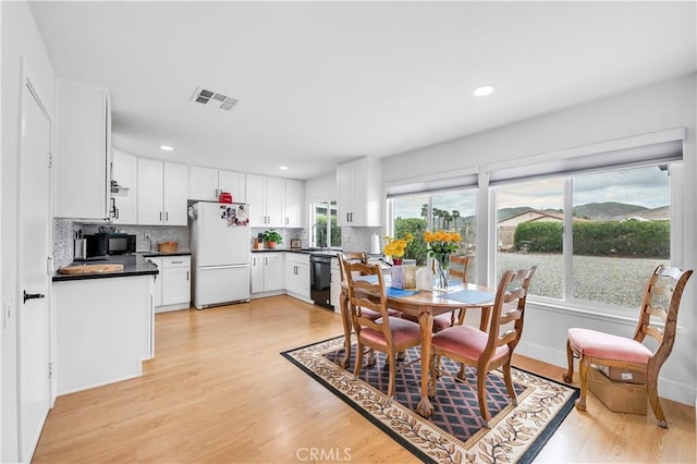 26414 Mehaffey St, Menifee, CA 92586 - dining area featuring visible vents, recessed lighting, and light wood-style flooring