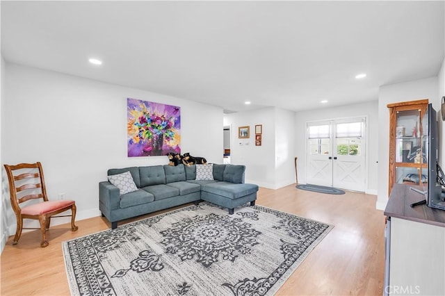 26414 Mehaffey St, Menifee, CA 92586 - living area with recessed lighting, light wood finished floors, and baseboards