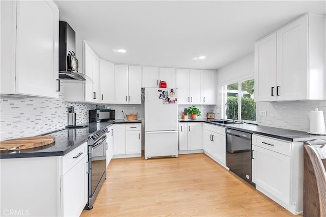 26414 Mehaffey St, Menifee, CA 92586 - kitchen featuring recessed lighting, black appliances, dark countertops, and white cabinets