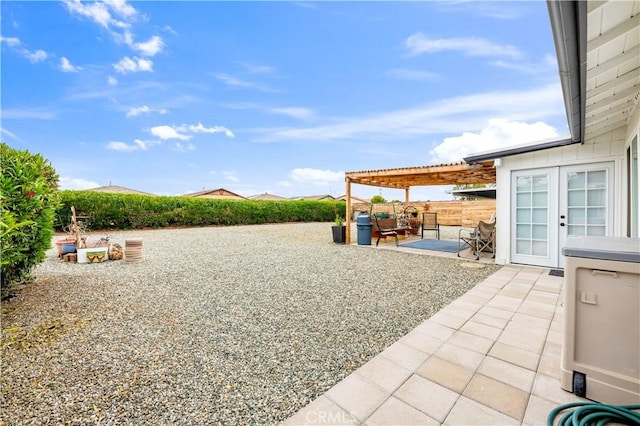 26414 Mehaffey St, Menifee, CA 92586 - view of yard featuring a patio, fence, french doors, and a pergola