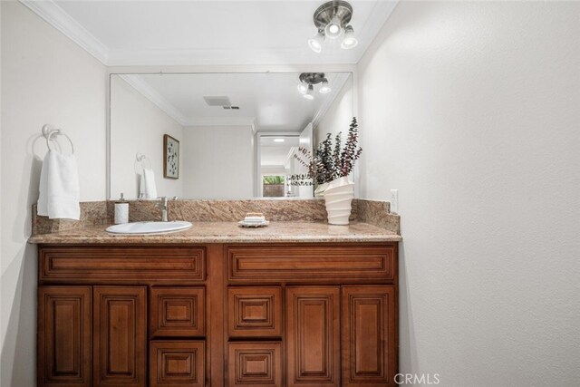 4200 Avenida Sevilla, Cypress, CA 90630 - bathroom featuring vanity and ornamental molding