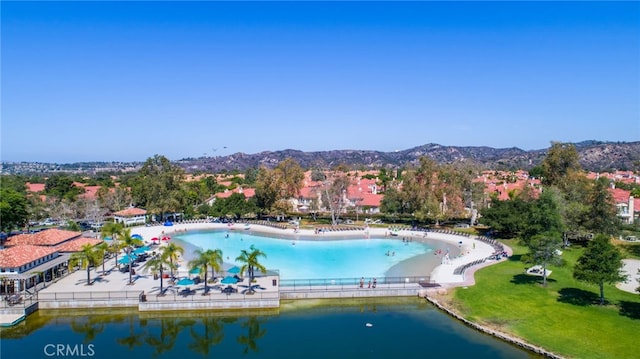 view of swimming pool featuring a mountain view