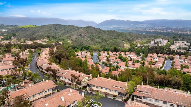drone / aerial view featuring a mountain view and a residential view