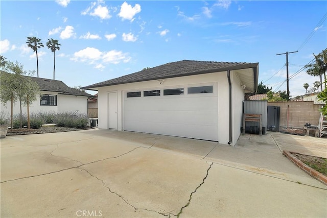 detached garage with fence