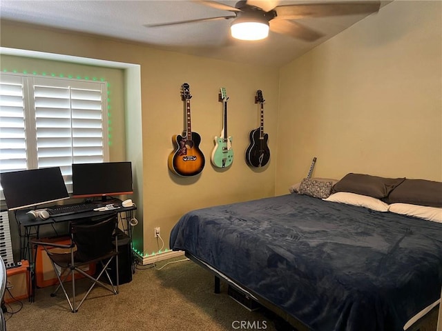 bedroom with carpet flooring, ceiling fan, and baseboards