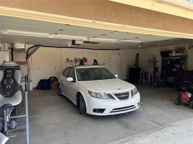 garage featuring a garage door opener