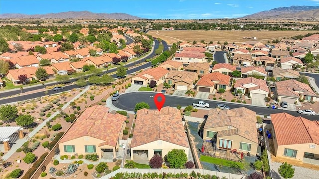 birds eye view of property featuring a residential view and a mountain view