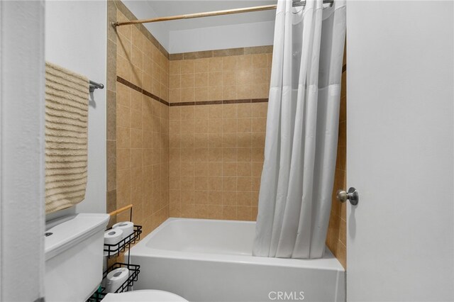 8990 19th St Unit 433, Rancho Cucamonga, CA 91701 - bathroom with shower / bath combo with shower curtain and toilet