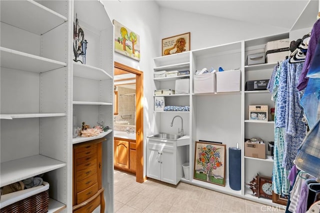 832 Onstott Rd, Lompoc, CA 93436 - walk in closet featuring lofted ceiling, light tile patterned floors, and a sink
