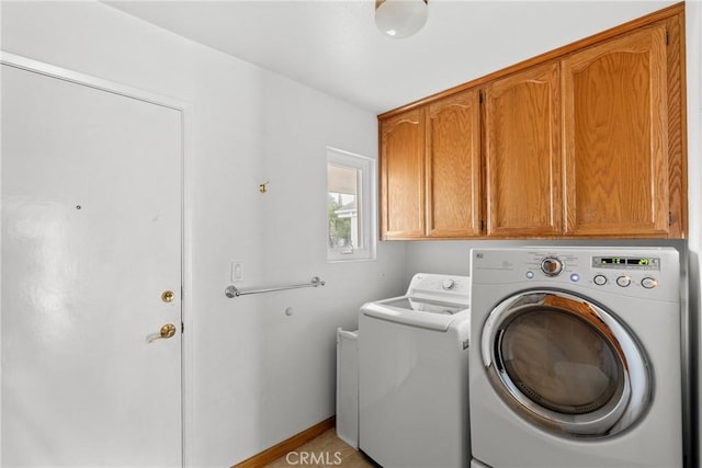 832 Onstott Rd, Lompoc, CA 93436 - clothes washing area featuring washer and dryer and cabinet space
