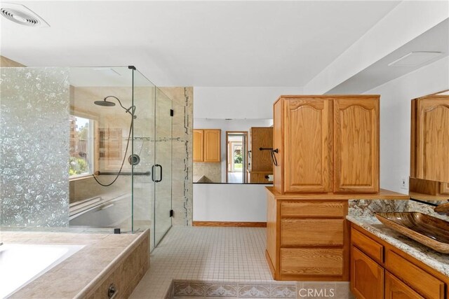 832 Onstott Rd, Lompoc, CA 93436 - full bathroom with tile patterned floors, visible vents, a shower stall, and vanity