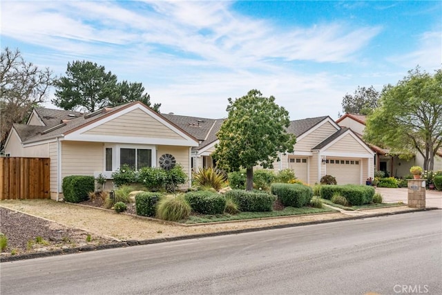 832 Onstott Rd, Lompoc, CA 93436 - view of front facade with fence, concrete driveway, and an attached garage