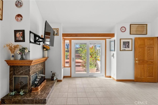 832 Onstott Rd, Lompoc, CA 93436 - entrance foyer with baseboards, a high end fireplace, and tile patterned flooring