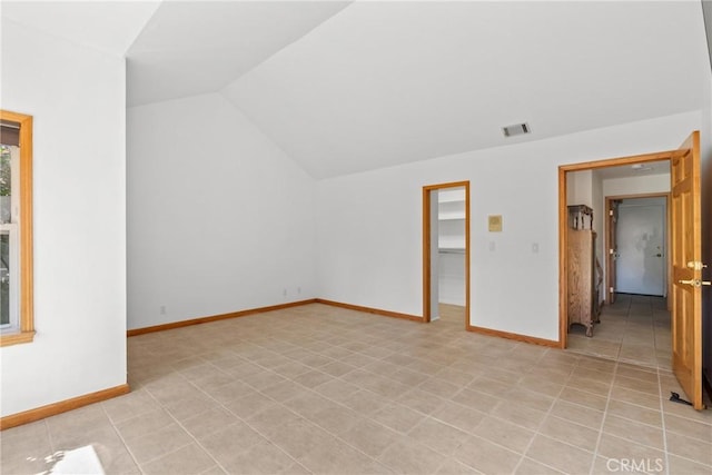 832 Onstott Rd, Lompoc, CA 93436 - unfurnished room featuring baseboards, visible vents, and lofted ceiling