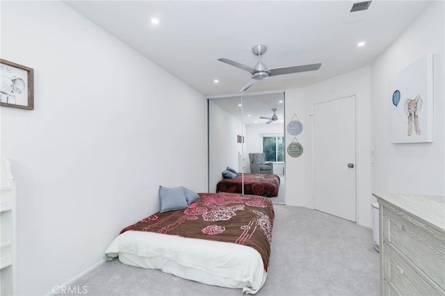 bedroom with visible vents, recessed lighting, ceiling fan, and light colored carpet
