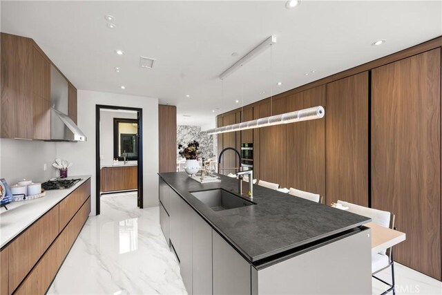 28 W La Sierra Dr, Arcadia, CA 91007 - kitchen featuring gas cooktop, a sink, marble finish floor, a large island, and modern cabinets