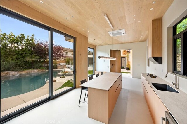 28 W La Sierra Dr, Arcadia, CA 91007 - kitchen featuring modern cabinets, recessed lighting, light countertops, wooden ceiling, and a sink