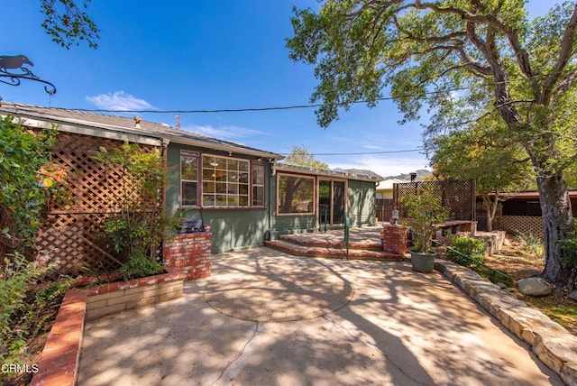 view of patio / terrace with fence