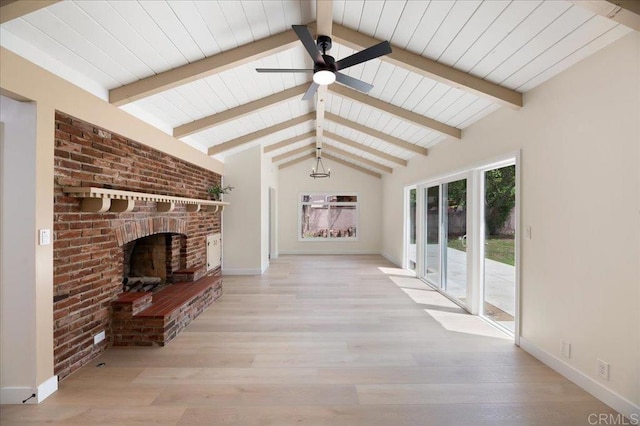 unfurnished living room featuring a brick fireplace, a ceiling fan, baseboards, wood finished floors, and wooden ceiling