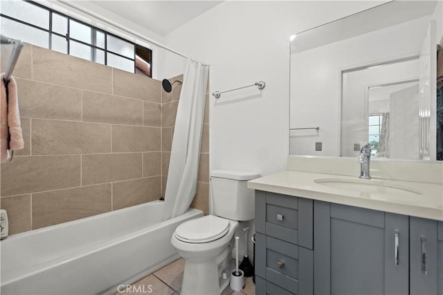 1029 S Reservoir St, Pomona, CA 91766 - bathroom with vanity, toilet, tile patterned flooring, and shower / bath combo with shower curtain