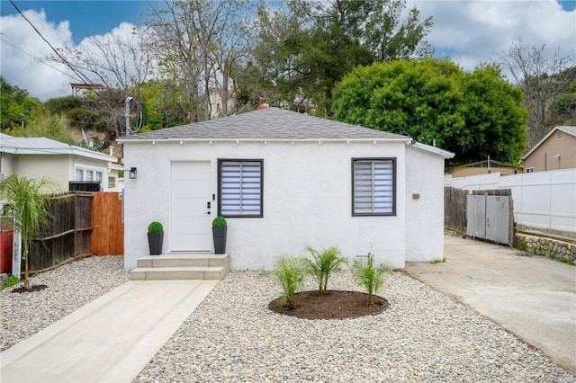 view of outdoor structure with fence