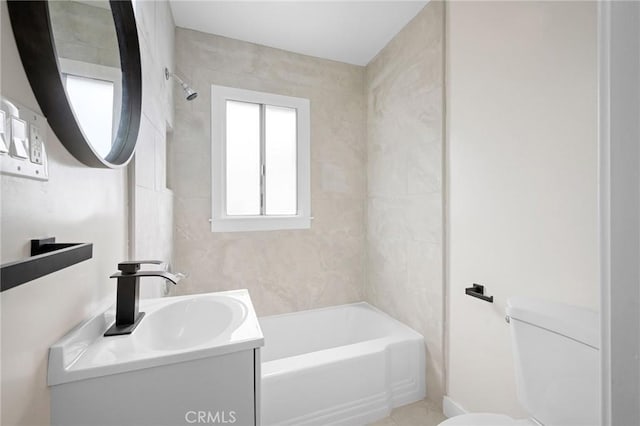 full bathroom with toilet and vanity